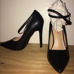 Black strapped heel